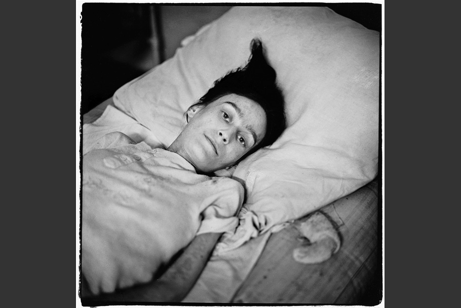 Hospital patient in a bed.