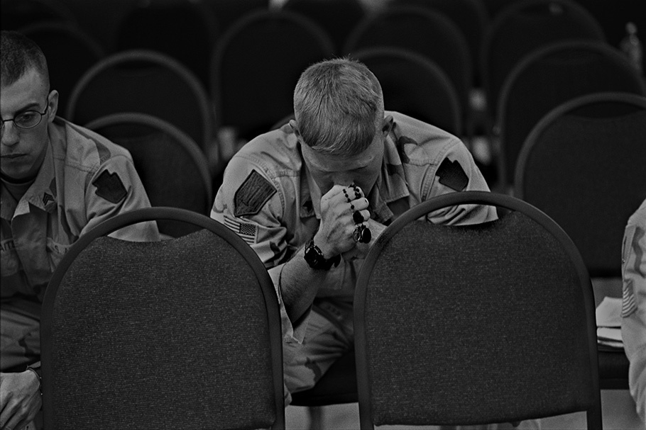 Soldier praying.