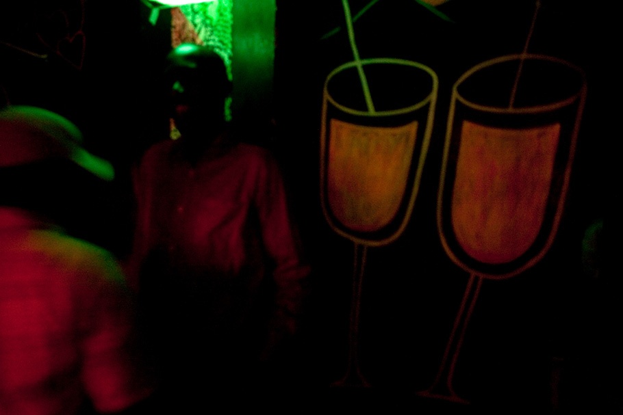 Bar scene with painted drinks.
