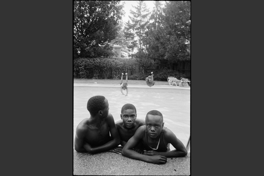 Teenage boys in a pool.