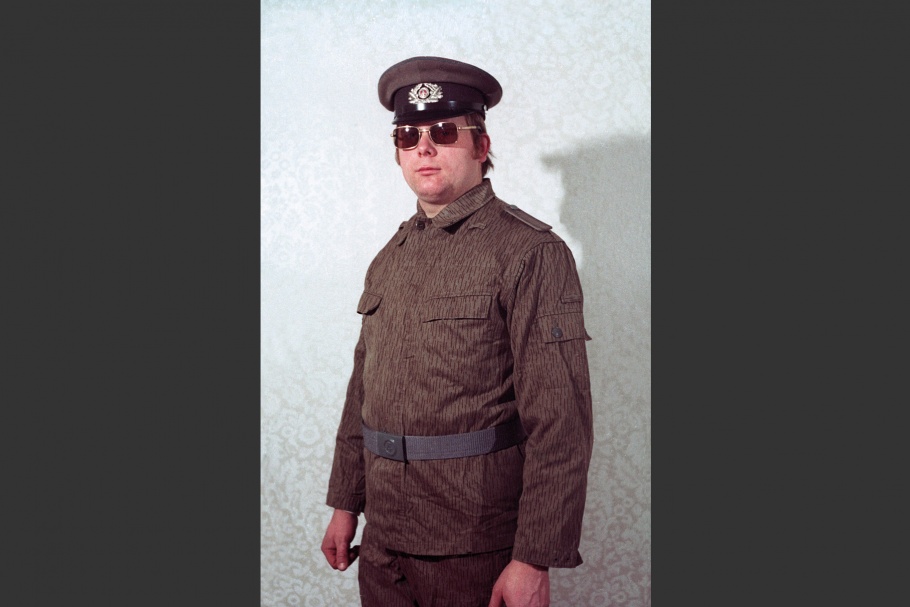 Man in uniform wearing sunglasses