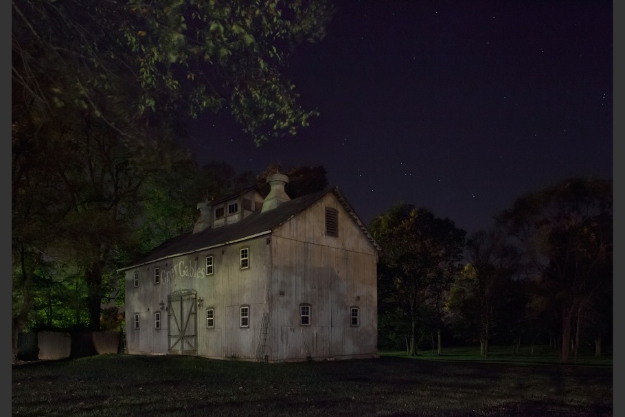 A barn at night