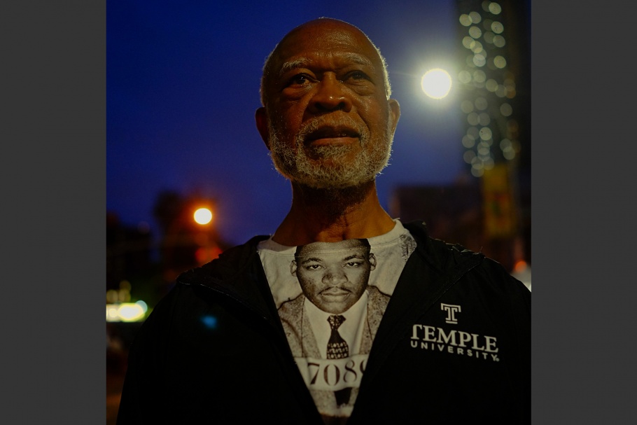 A man wearing a shirt of Martin Luther King Jr.