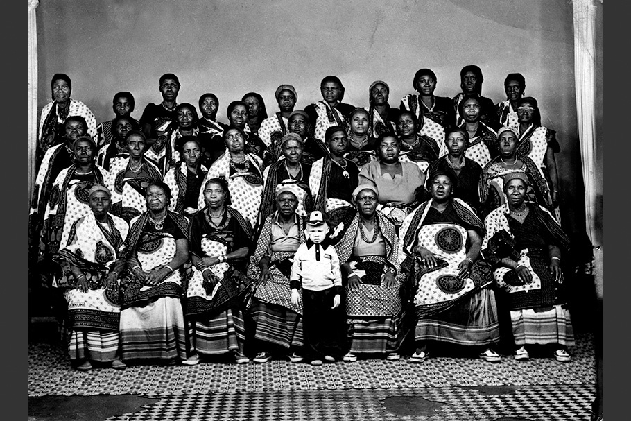 A large group of women posing for a photo.